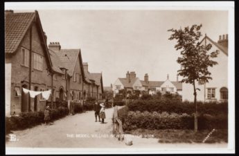 Black and white postcard showing houses in New Earswick village