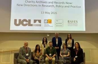 The panel of speakers and organisers on stage at the British Academy
